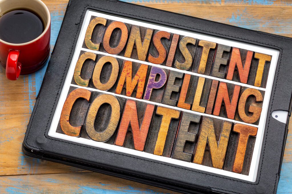 consistent, compelling content - recommendation for bloging and social media marketing - a word abstract in vintage letterpress wood type on a digital tablet with a cup of coffee to illustrate What’s the Recipe for Writing Effective Content